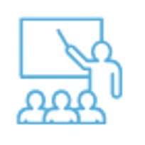 Teacher at a board in front of a seated class